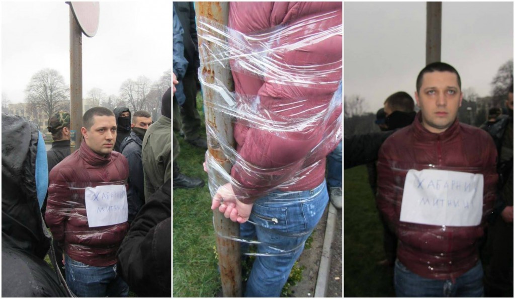 "Правый сектор" арестовал руководителя Чопской таможни и примотал его скотч к столбу позора.